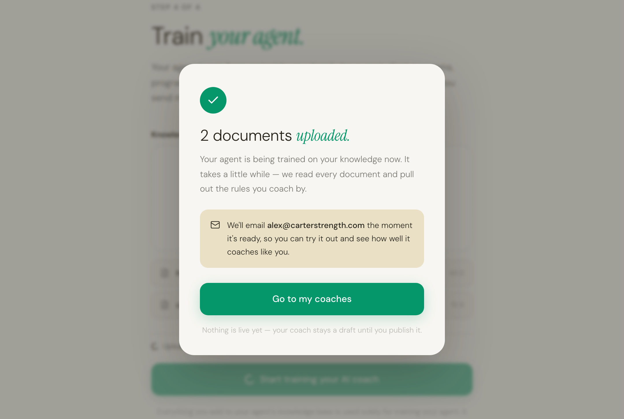 The confirmation dialog: two documents uploaded, with a note that we'll email when the agent is ready.